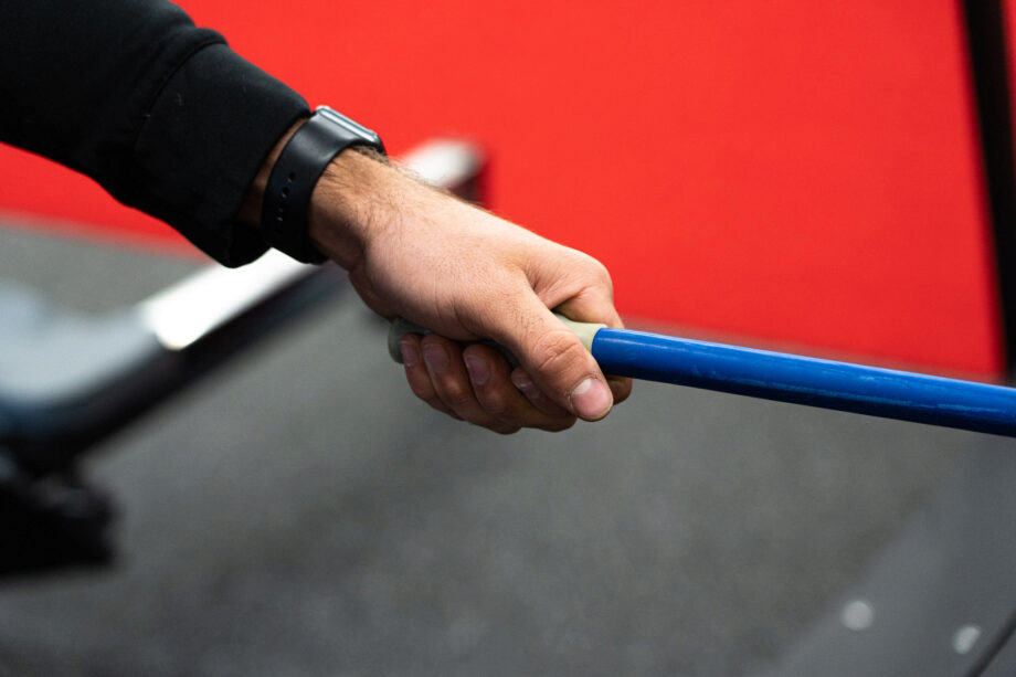 Hand grasping the Inertia Wave