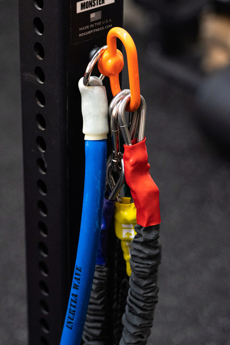 Inertia Wave hooked up to squat rack