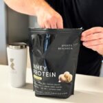 Man using Sports Research Whey Protein