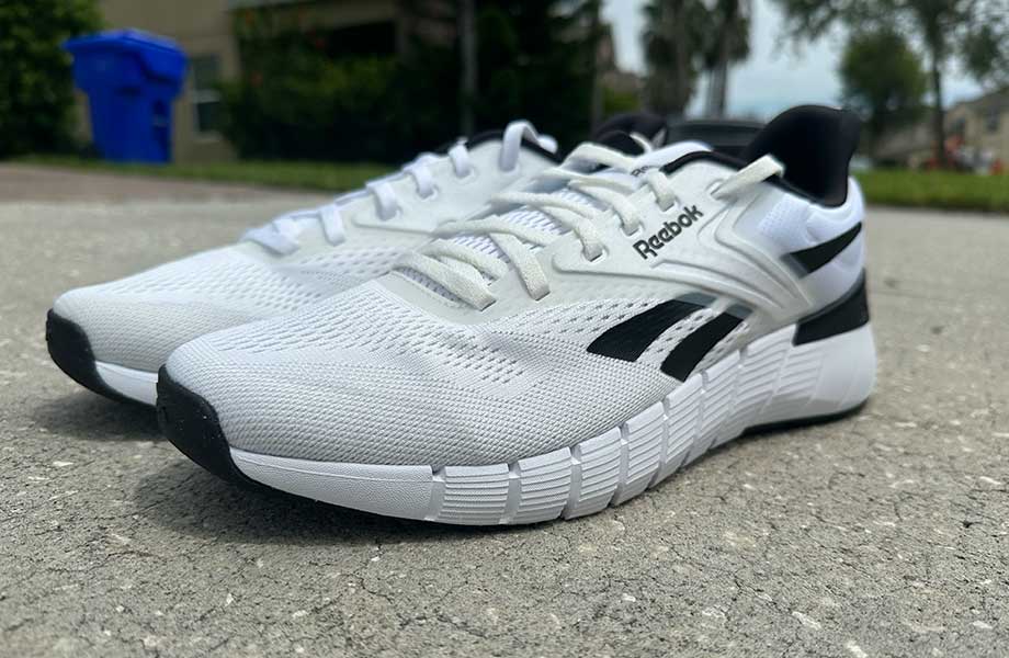 A pair of Reebok Nano Gym Shoes outside