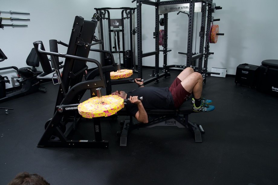 Coop gets ready to try a bench press on the Bells of Steel Dreadmill. 