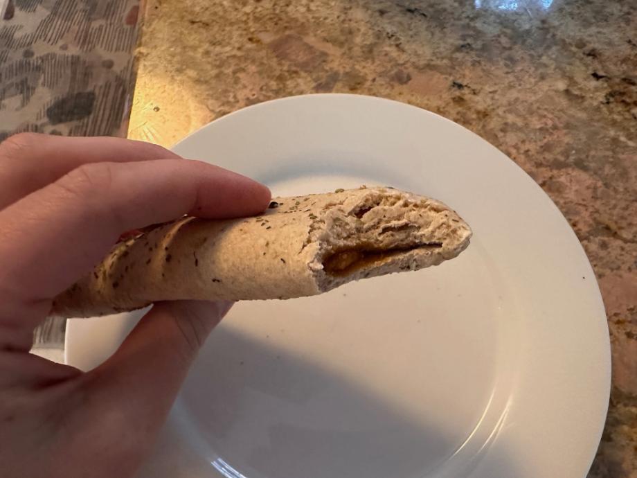 A Nutrisystem Chicken Mozzarella Melt with a bite taken out of it.