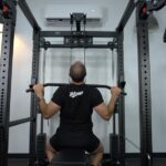 Man performing lat pulldowns for the Body-Solid Functional Trainer Rack review