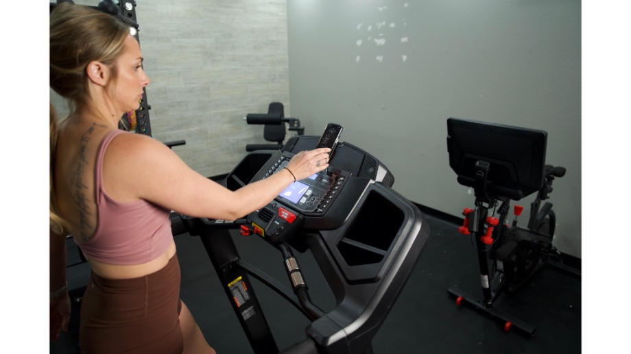 Phone in media shelf on Bowflex BXT8J treadmill