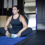 woman doing butterfly stretch