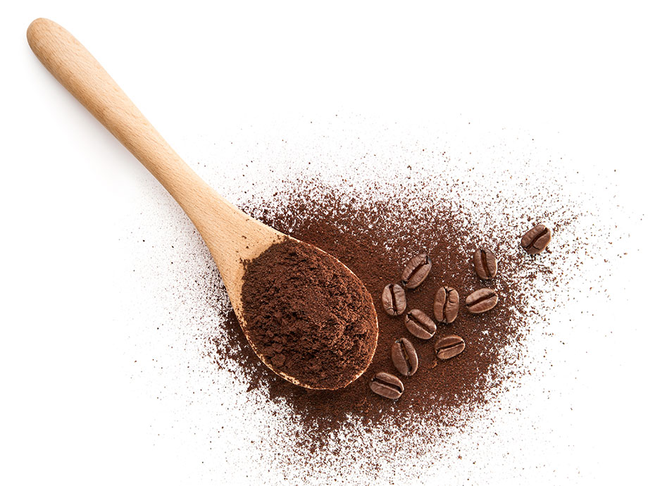 coffee-beans-and-grounds-in-a-spoon