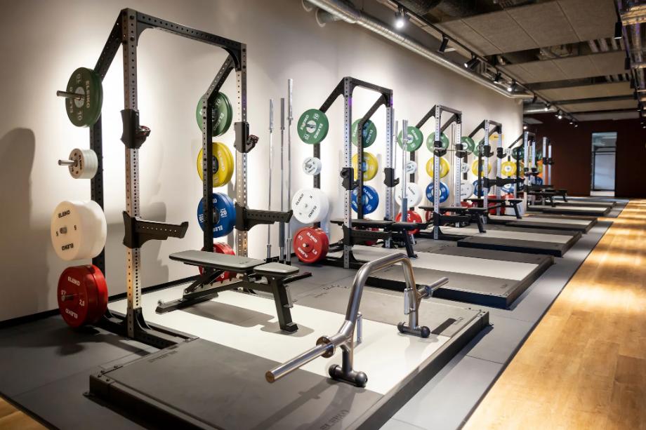 Eleiko Prestera Racks with lifting platforms along the wall of a gym