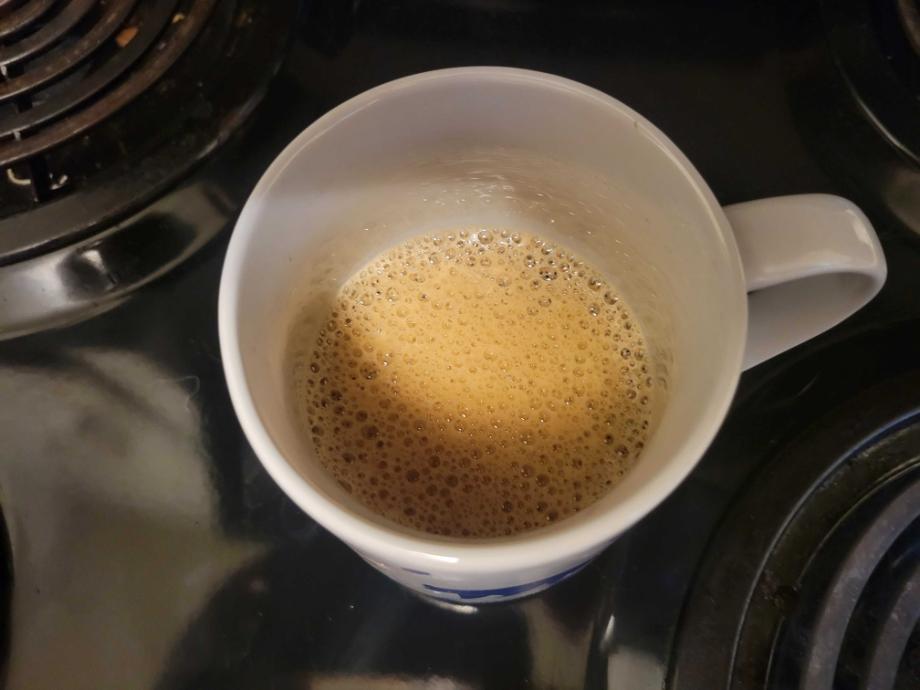 A freshly-frothed cup of Everyday Dose mushroom coffee. 