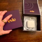 A person opening the box for an Evie Ring