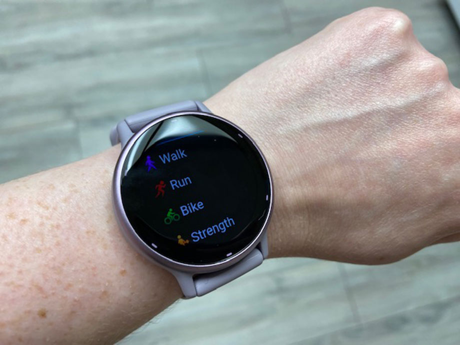garmin vivoactive 5 on wrist showing activity tracking screen