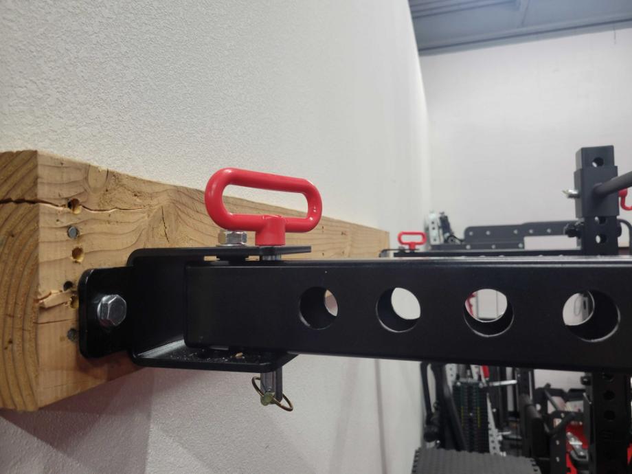 A close-up of the wall mount and pins on the Giant Wall Rack 2.0