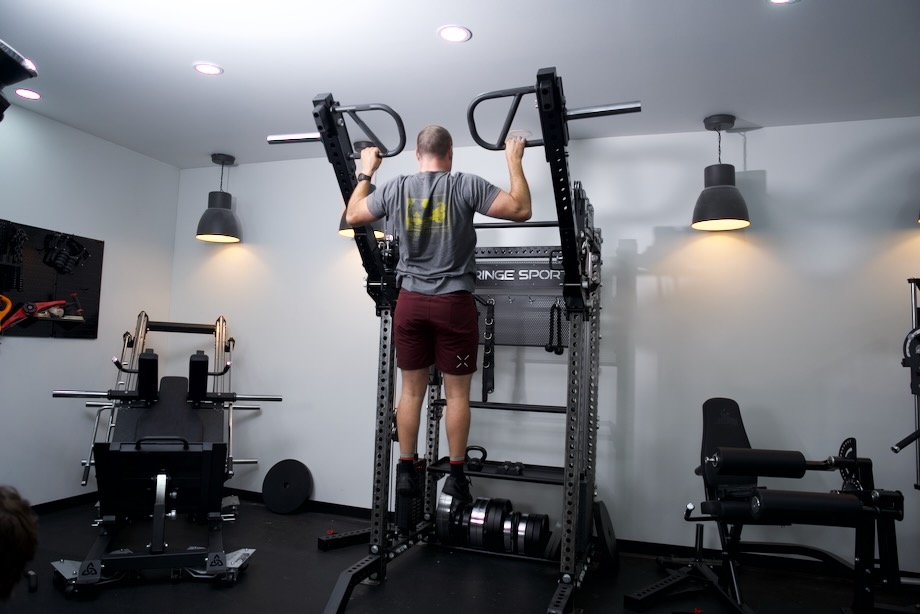 Coop doing a pull-up with the Griffin Adjustable Jammer Arms