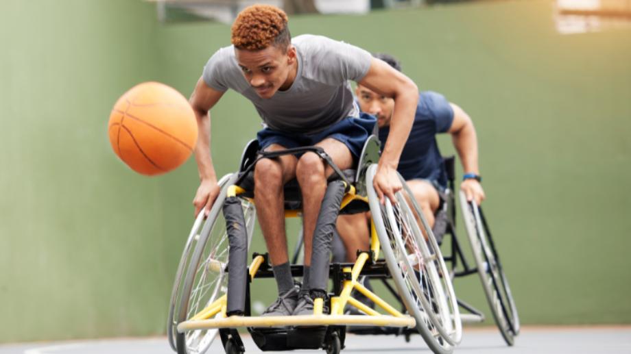 Two wheelchair users play an intense game of basketball. Credit: PeopleImages.com Yuri A / Shutterstock