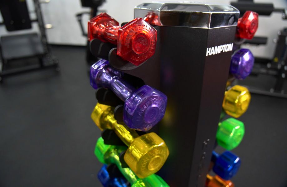 Urethane coated Hampton Jelly Bell weights in vertical dumbbell rack