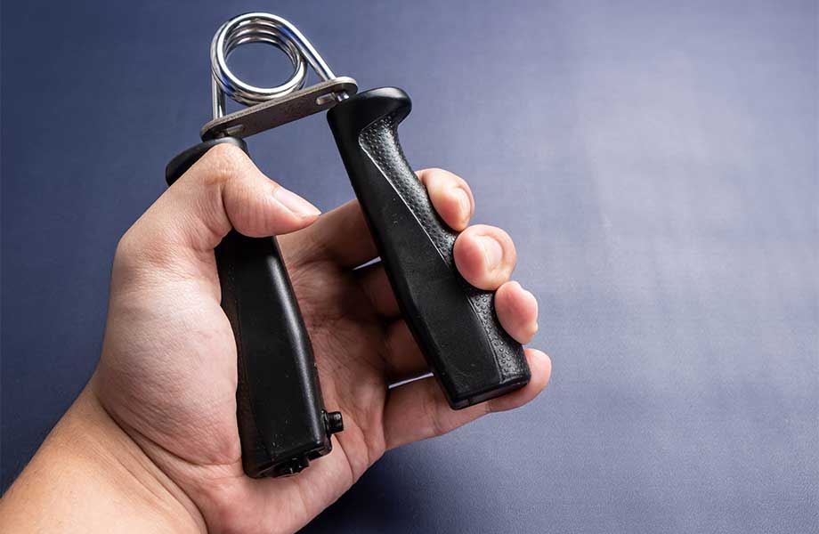 Holding a grip strengthener