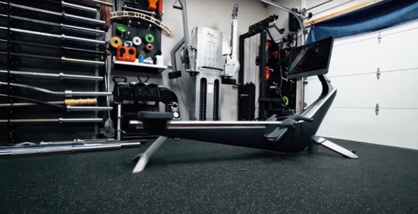 Hydrow rowing machine sitting in a gym.