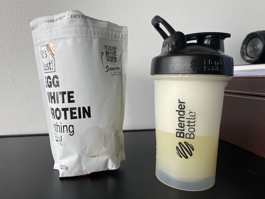 Protein Powder In The Cup-supplement For Athletes On A White