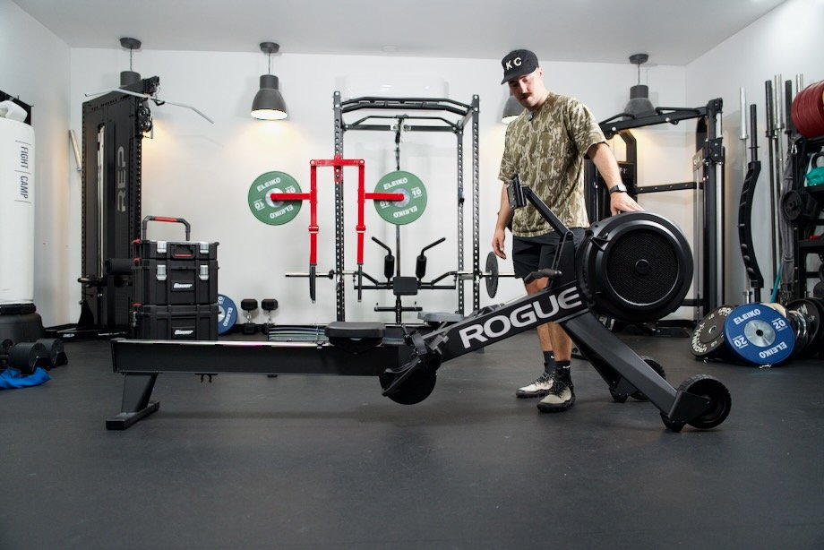 Man standing next to Rogue Echo Rower