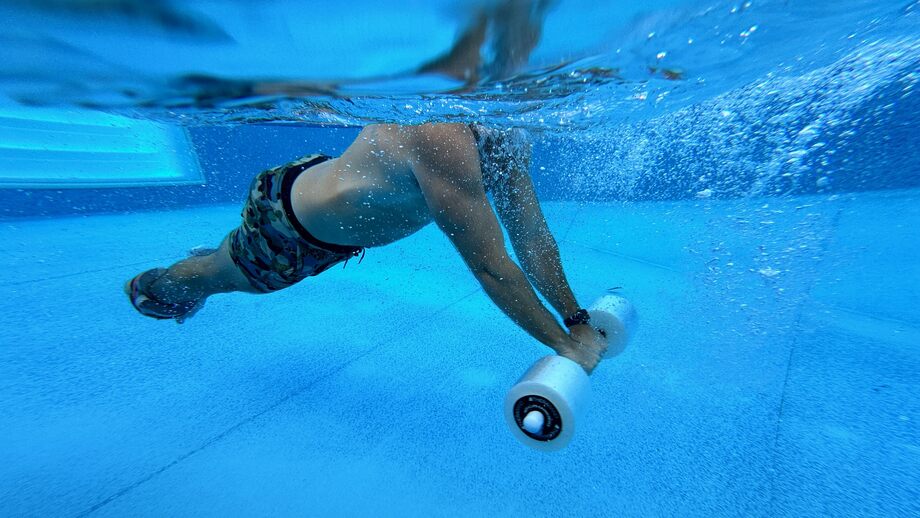 An underwater view of our tester using a Theraband Swim Bar