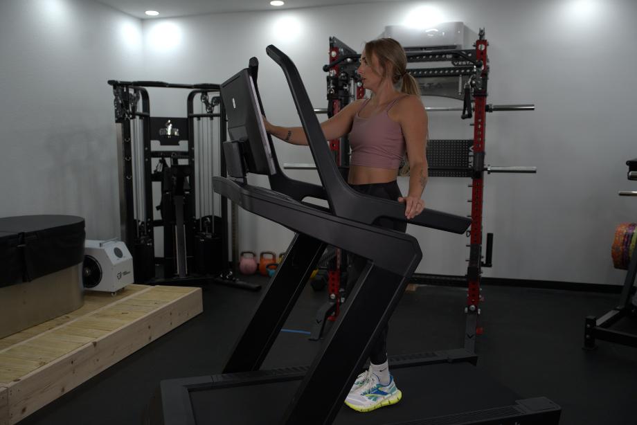 Woman using the NordicTrack X24 Treadmill