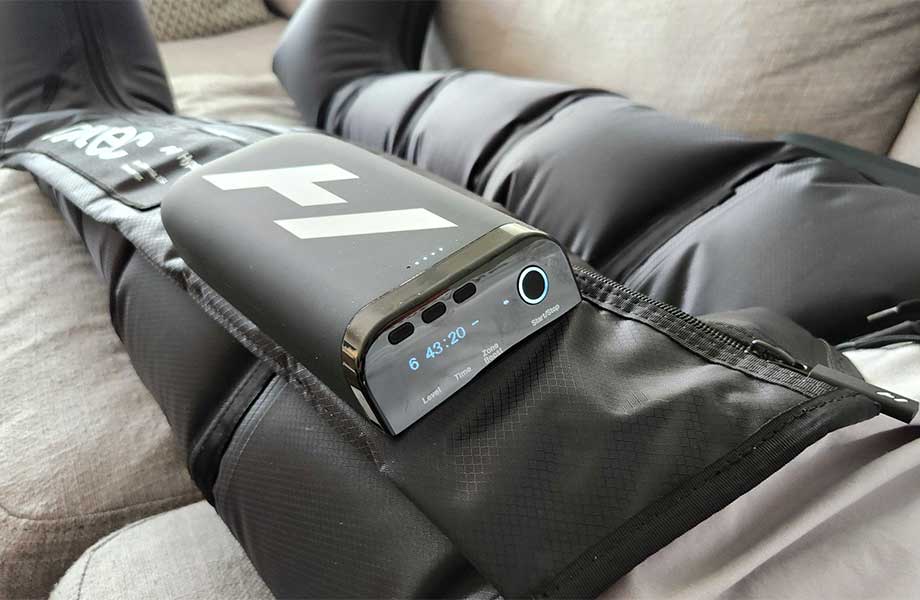 A close look at the controller for a pair of Normatec Elite Recovery Legs.