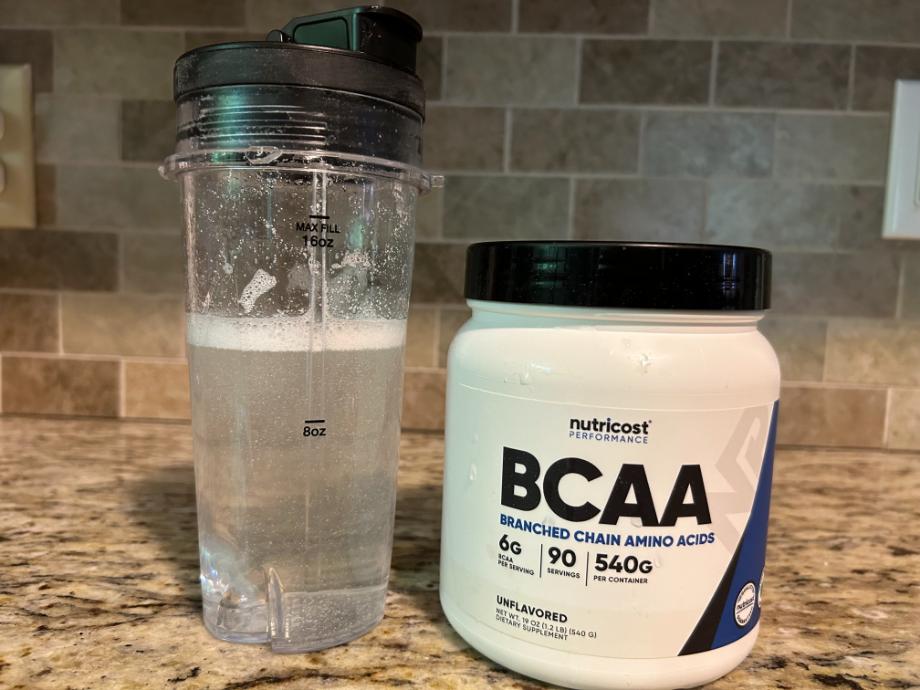 Nutricost BCAA Powder on a counter.