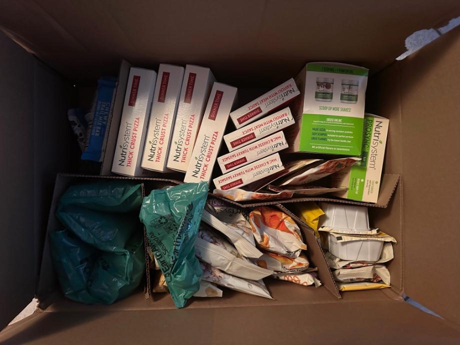 Looking into a box of shelf-stable food from Nutrisystem.