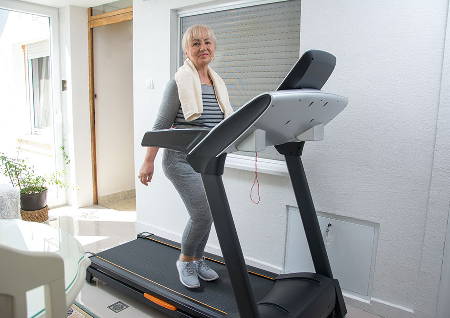 older-adult-walking-on-treadmill