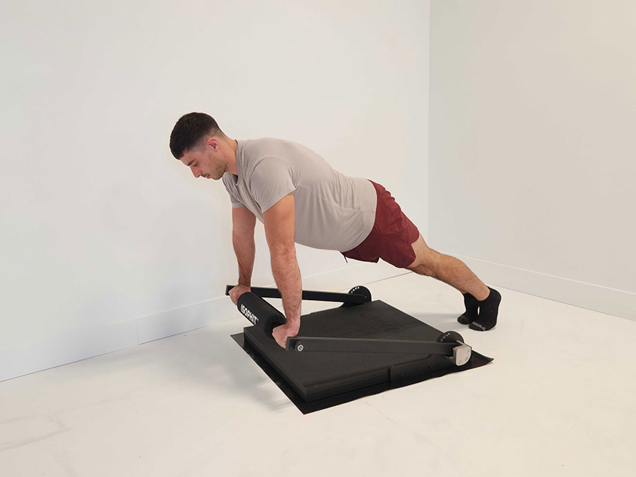 A man is shown performing a plank with an Isophit Strength Trainer