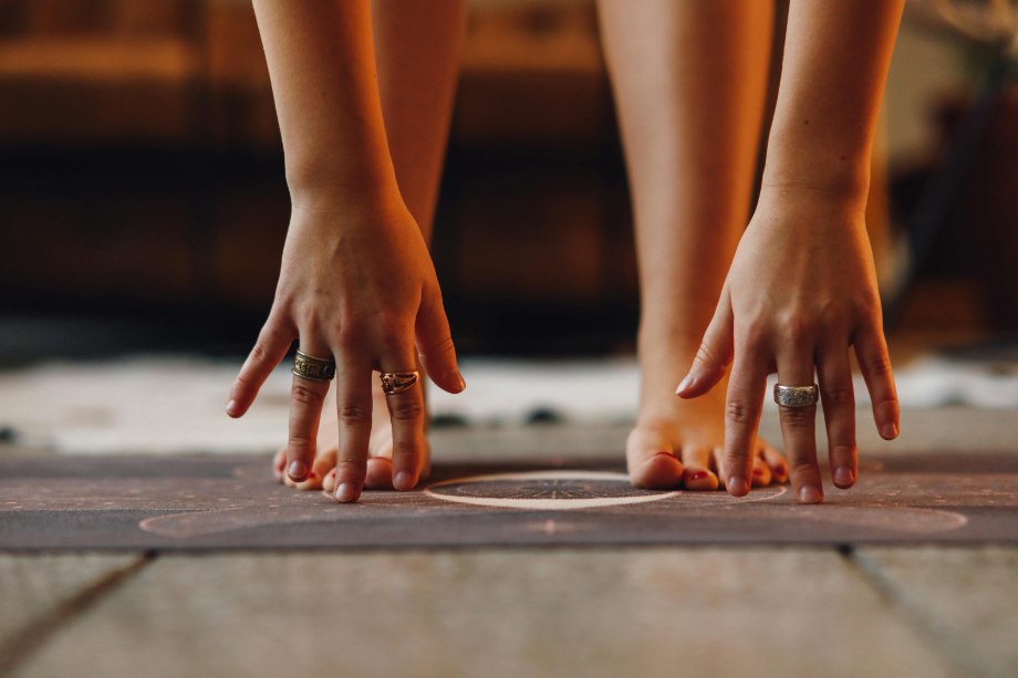 Person with bare feet on a mat