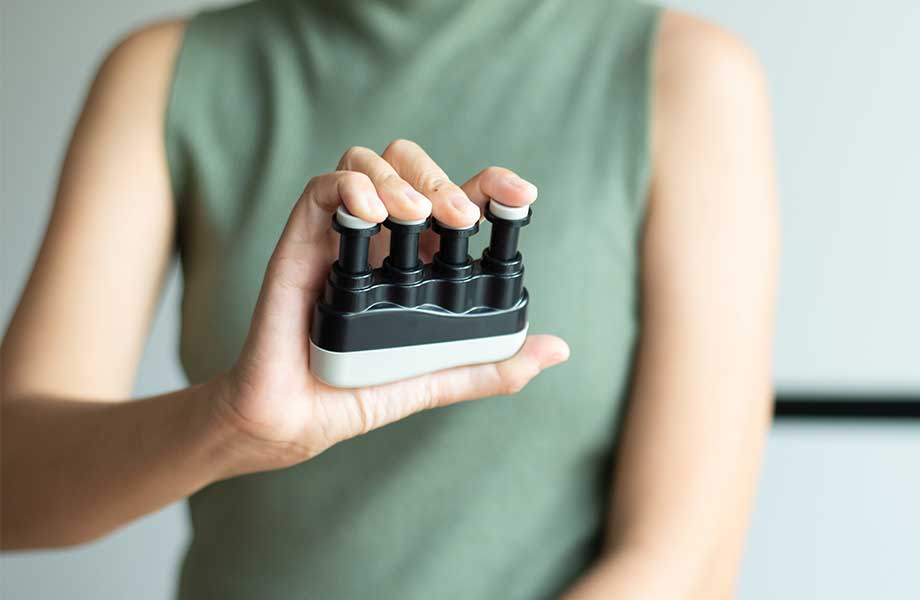 How To Use Grip Strengtheners to Enhance Your Weightlifting Performance Cover Image