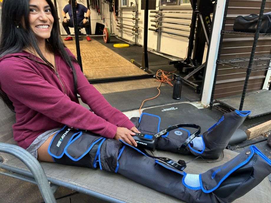 A person smiles while using the Reathlete Air-C boots