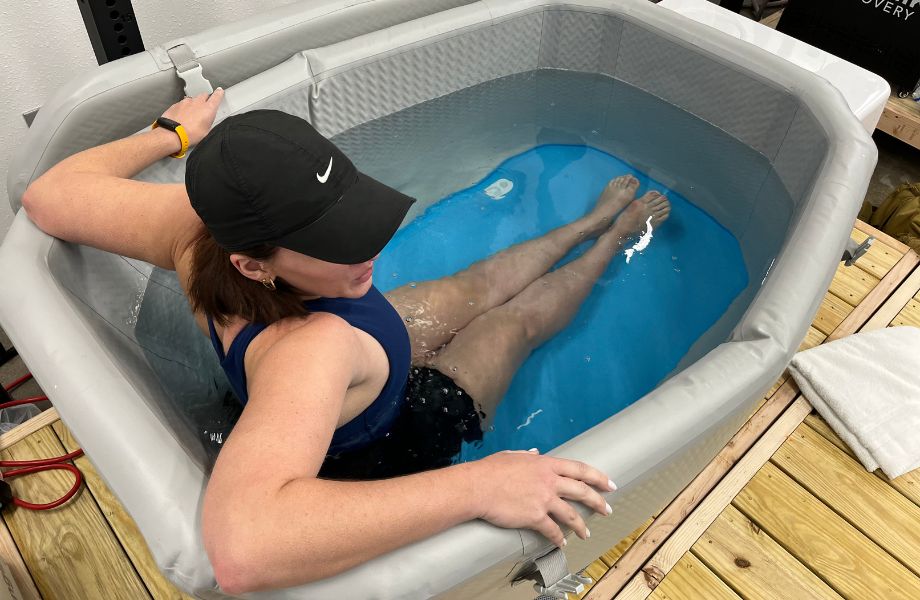 Woman sitting inside Plunge Air ice bath