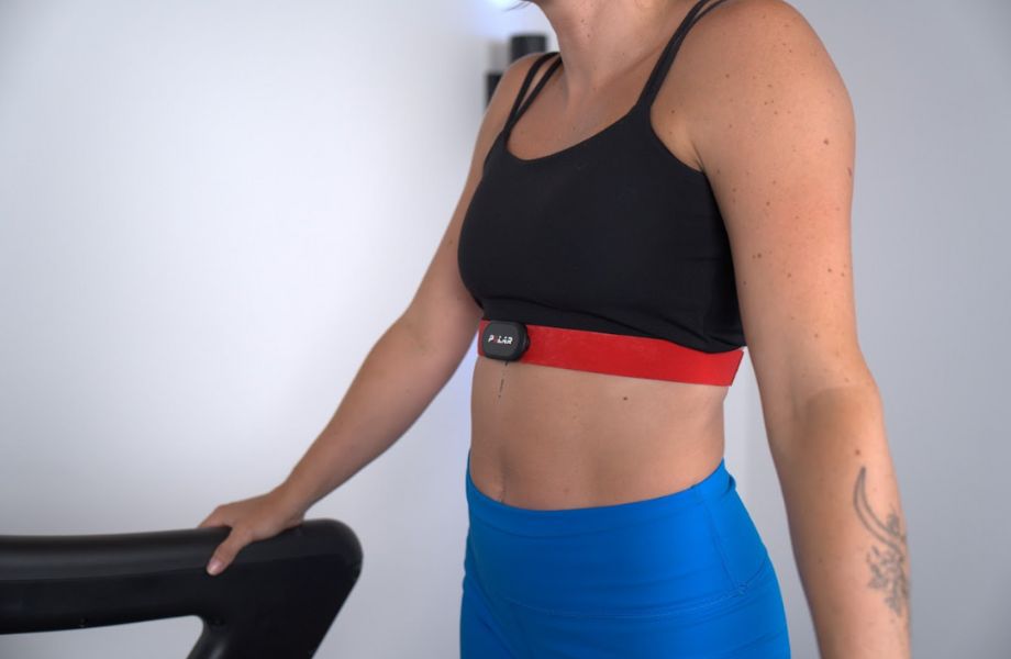 Woman wearing Polar H10 heart rate monitor around the chest