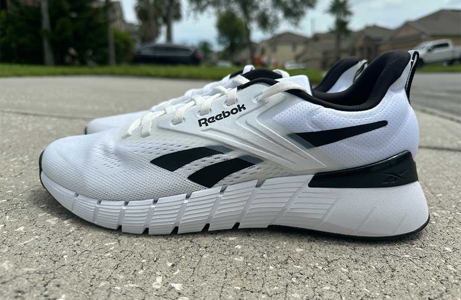 Side view of a pair of Reebok Nano Gym Shoes