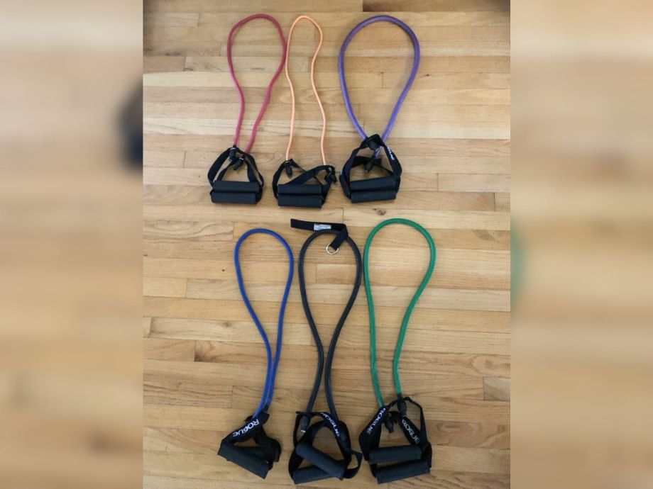 rogue tube resistance bands on wood floor