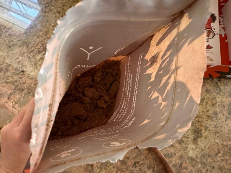 Looking into an opened bag of RYZE Mushroom Coffee.