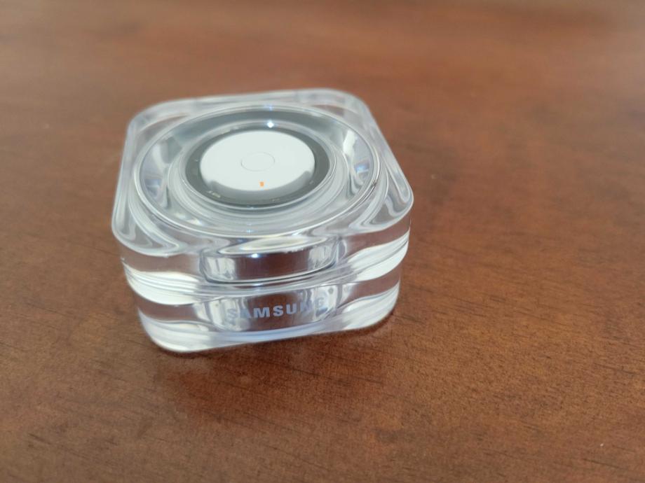 A Samsung Galaxy Ring charges in the charging case