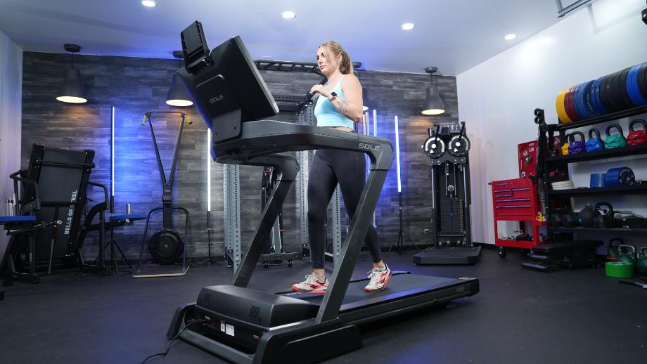 Woman jogging on Sole F89 treadmill