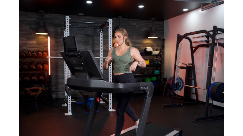 woman running on sole tt8 treadmill