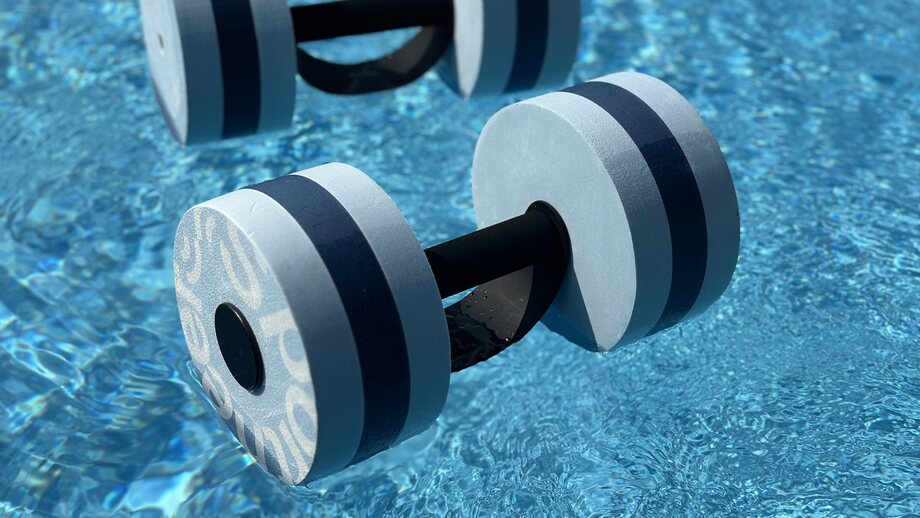 Sportneer Water Weights floating in a pool