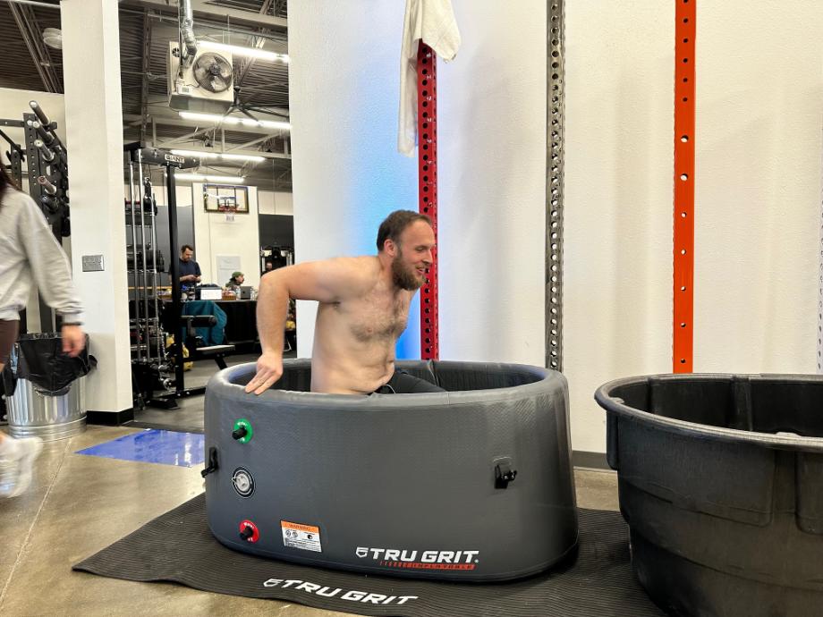 Our tester lowers down, down, into the icy depths of the Tru Grit Cold Tub.