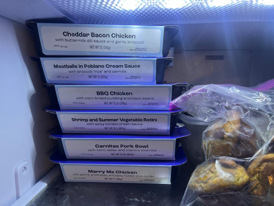 A stack of Tempo meals in a freezer