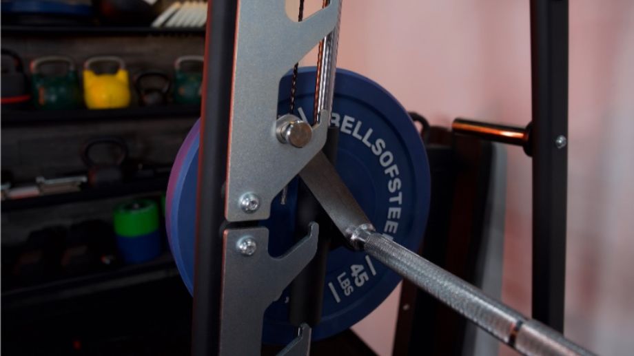 A close look at a racked bar on the Titan Smith Machine.