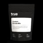 A bag of True Nutrition protein powder with a black background