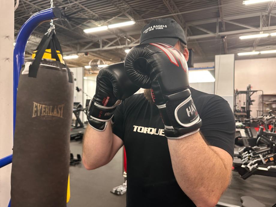 Man wearing the Hawk Sports Boxing Gloves