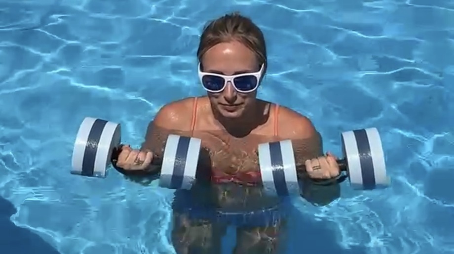 Lindsay Scheele, CPT uses Sportneer Water Weights in a pool