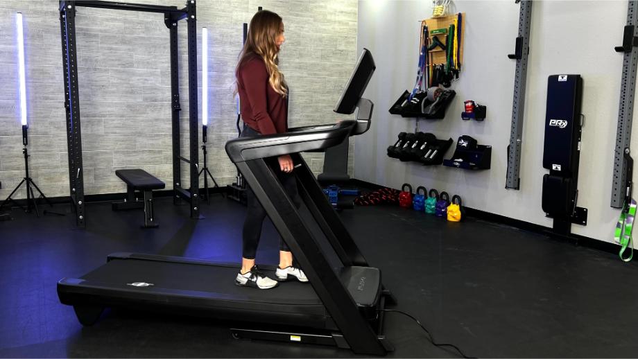 An image of a woman walking on the new NordicTrack Commercial 1750 treadmill, one of the best treadmills for walking